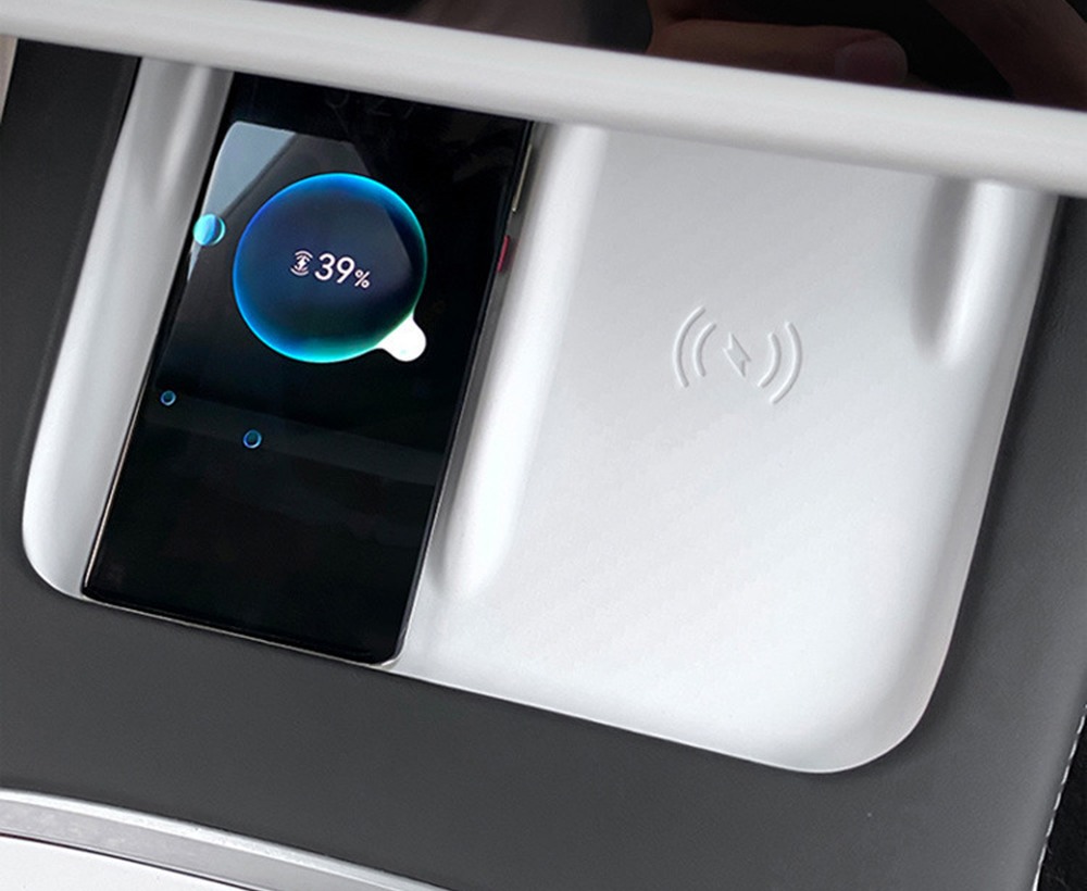 Wireless charger mat covering the Tesla charging surface
