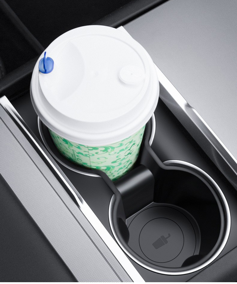 Drink sitting in the Tesla cup holder with the silicone insert installed
