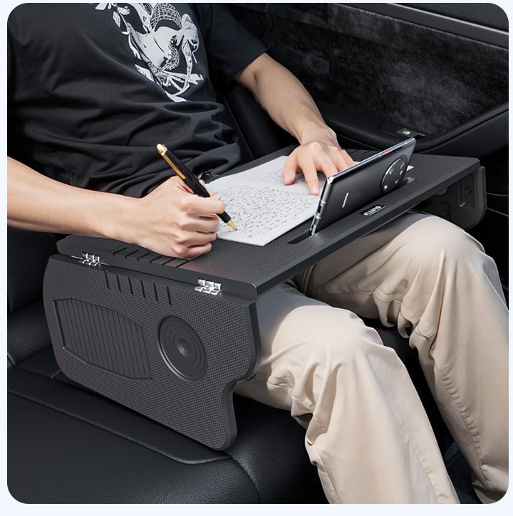 Foldable steering wheel tray table in compact mode