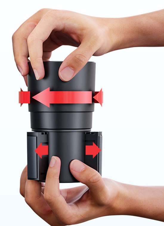 Expandable cup holder mounting base being adjusted by hand