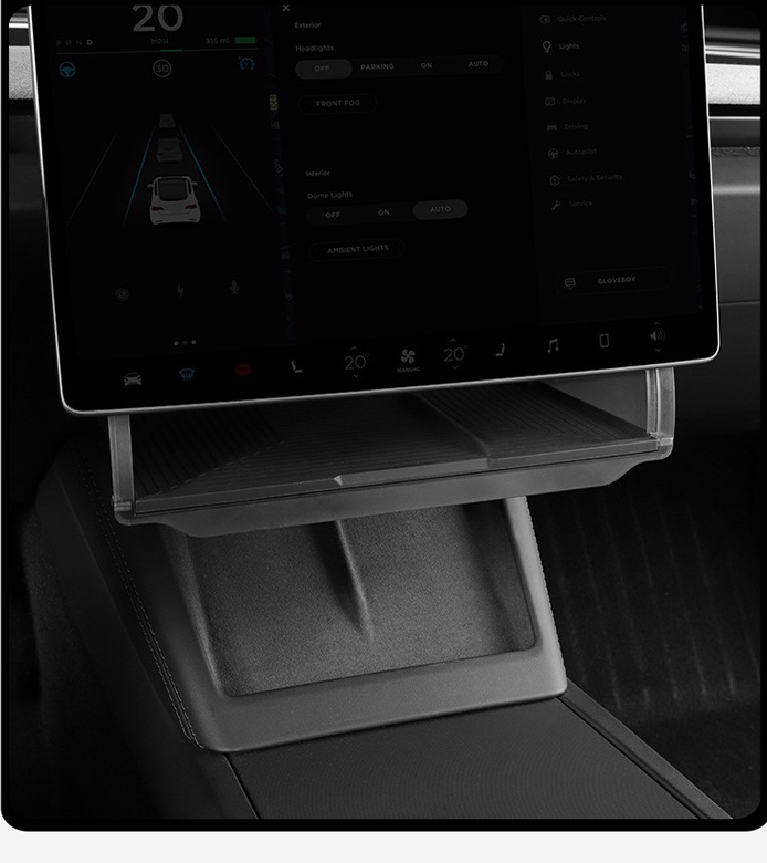 Tesla under-screen storage organizer installed below the center display