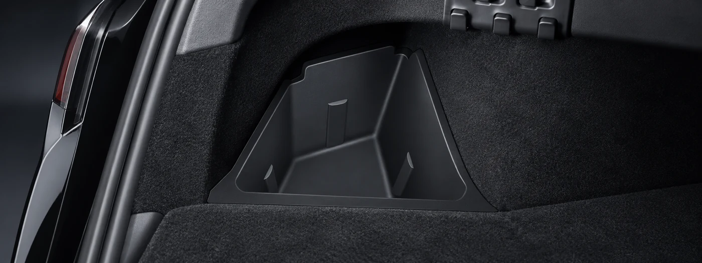 Rear trunk storage bin installed with OEM-style fit