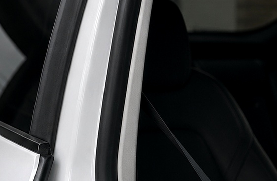 Tesla Model Y door opening with B-pillar seal