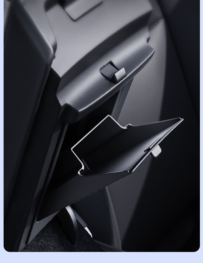 Close-up of the recessed pull handle and storage door