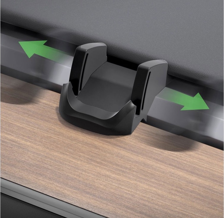 Tesla phone holder sliding left and right along the dashboard trim