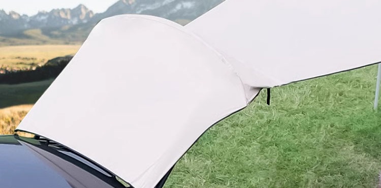 Close view of the awning fitted over a Tesla Model Y rear hatch