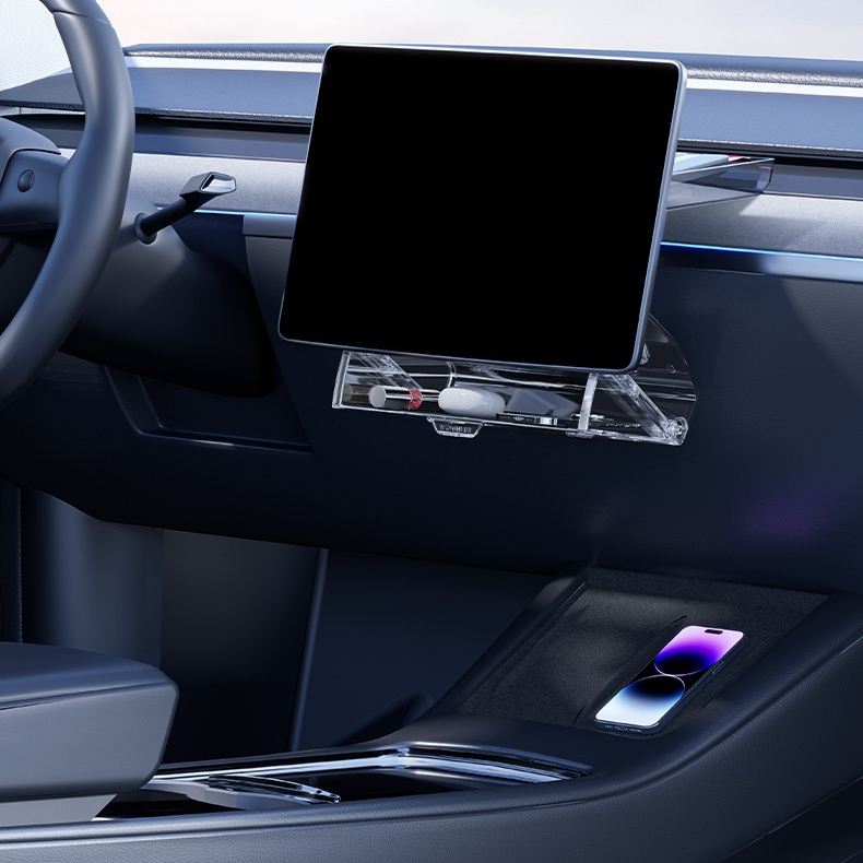 Two-level Tesla screen storage organizer installed while the wireless charging area remains open